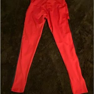 New Daniel Patrick leggings full length large. Red black stripe down sides
